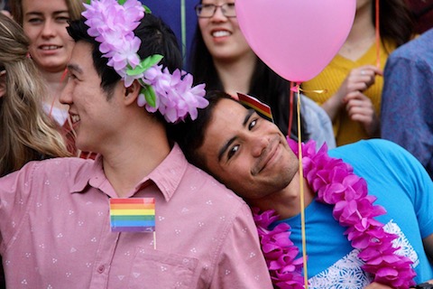 Young people supporting LGBTQ+ 'rainbow' youth..