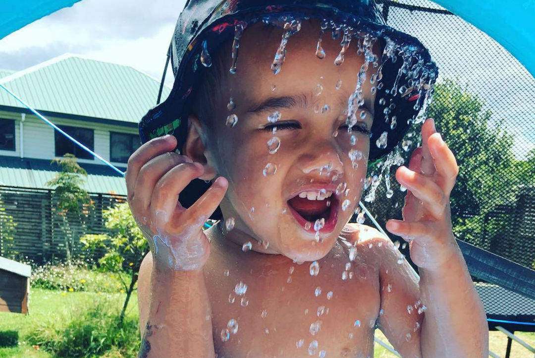 Child playing with water. .